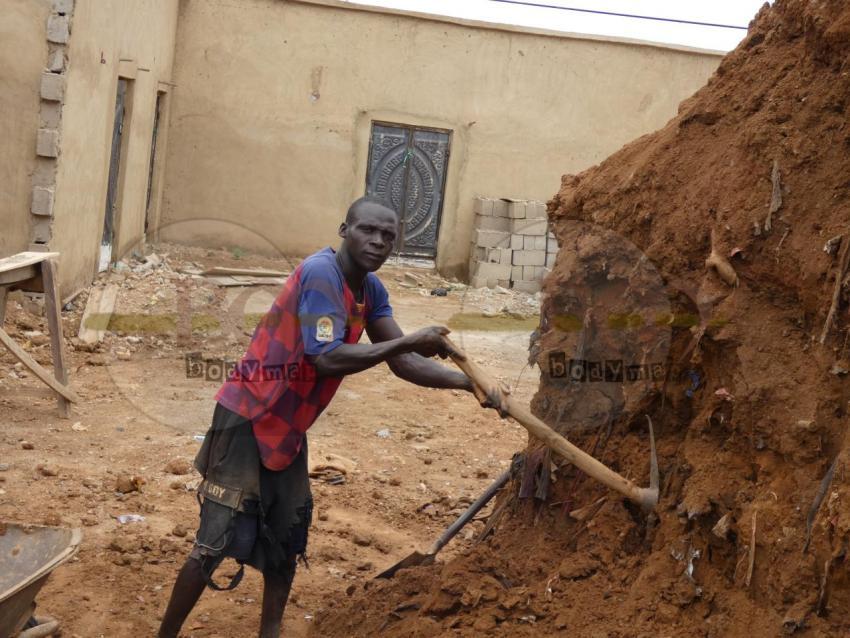 Digging heaps of sand